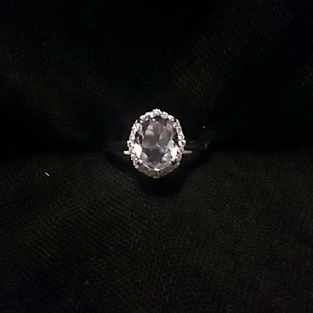 Light Tanzanite With White Topaz On Irodium
